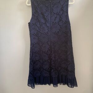 Navy flattering dress. I’m 5’3 and hits above knee. Beautiful fabric